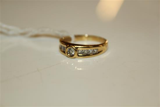 18ct yellow gold and diamond line-set ring